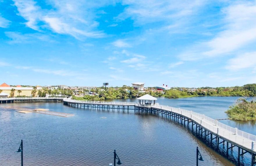 Laketown Wharf Resort: Perfectly located in the heart of Panama City Beach and just steps from the Gulf's pristine white sand and aqua water. This well-appointed condo features an open floor plan, private balcony, and beautiful views of the serene lake. This unit is completely remodeled! Located on the second floor, step into luxury and comfort with this contemporary  one-bedroom, two-bathroom condo. A cozy bunk area and a sleeper sofa ensure ample space for extra guests. Prepare meals and snacks in a  a fully equipped kitchen. Enjoy resort-style amenities including five pools, hot tubs, fitness center, lakefront boardwalk, and nightly fountain shows. Conveniently located near dining, shopping, and entertainment, this condo offers excellent rental potential or the perfect beach getaway.