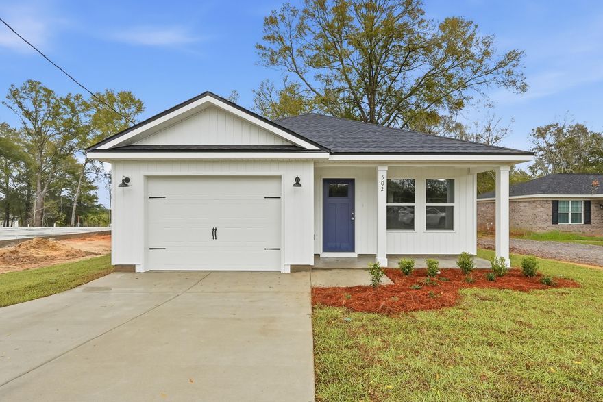 CONVENIENT MID-TOWN LOCATION - READY END OF JUNE - BUDGET FRIENDLY - All packed into the 'Scarlet' floor plan.  Seller will contribute up to $10,000 towards buyers closing costs (call for details).  Vinyl plank flooring throughout, landscaped yard, front & rear porches for relaxing, finished garage.  Raised ceilings, recessed lighting, quartz work island w/bar seating, corner walk-in pantry, walk-in closet in owner's bath w/double vanities, large laundry room, ceiling fans thru-out, white shaker style cabinets.  Photos of similar sold home, elevation will vary, interior/exterior colors & finishes will vary.