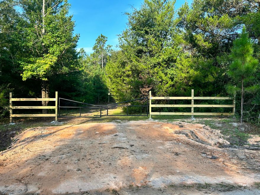 Welcome to 8 acres with a great starter Cabin to call it home!  This property is gated and private.  Once through the gate you will find a cabin with electricity,  a small sustainable bathroom, living and kitchen area.  The property also has a 30 & 50 amp hookup for RV or Camper.  A perfect set up to escape hurricanes, create a hunting camp or live while planning your dream house. There are food plots in place, excellent deer and turkey hunting.  Location is minutes away from Morrison and Ponce De Leon Springs.  The Gulf of American beaches are about 40 minutes away.  The property does not have a well, septic or water.  Schools for this property will be Vernon.