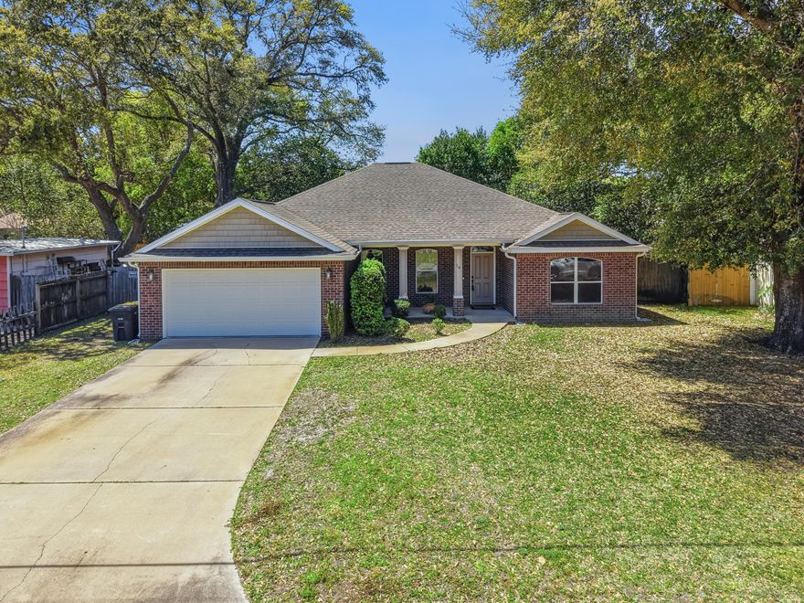 Seller to replace roof with acceptable offer. Homes for sale in Fort Walton Beach near Choctawhatchee Bay rarely offer this combination of location and move-in ready condition. Located in the desirable Elliott's Point, this 3 bed, 2 bath ranch home features an open floor plan, raised ceilings, and spacious living areas ideal for everyday living and entertaining. The kitchen offers granite countertops, stainless steel appliances, pantry, and a raised breakfast bar overlooking the dining and living areas. Large windows bring in abundant natural light, while tile flooring runs through the main spaces. The primary suite includes tray ceiling, walk-in closet, double vanity, garden tub, and separate shower. Enjoy a covered back porch and fenced backyard, perfect for relaxing or entertaining