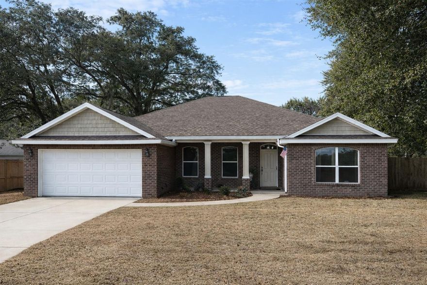 Homes for sale in Fort Walton Beach near Choctawhatchee Bay rarely offer this combination of location and move-in ready condition. Located in the desirable Elliott's Point neighborhood, this 3 bedroom, 2 bath ranch home features an open floor plan, raised ceilings, and spacious living areas ideal for everyday living and entertaining. The kitchen includes granite countertops, stainless steel appliances, pantry, and raised breakfast bar overlooking the dining and living areas. Large windows provide abundant natural light while tile flooring runs through the main spaces. The primary suite features tray ceiling, walk-in closet, double vanity, garden tub, and separate shower. Enjoy outdoor living with a covered back porch and fenced backyard, perfect for relaxing or entertaining.