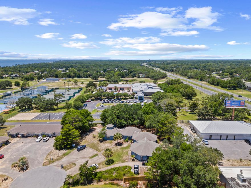 Income-producing 4-plex near Emerald Coast beaches. Property includes one 3BR unit and three 2BR units. Three units are currently tenant-occupied. Located in the College De Sec area with convenient access to beaches, shopping, dining, and major roadways. Buyer to verify all information. Excellent opportunity for investors—schedule a showing today.