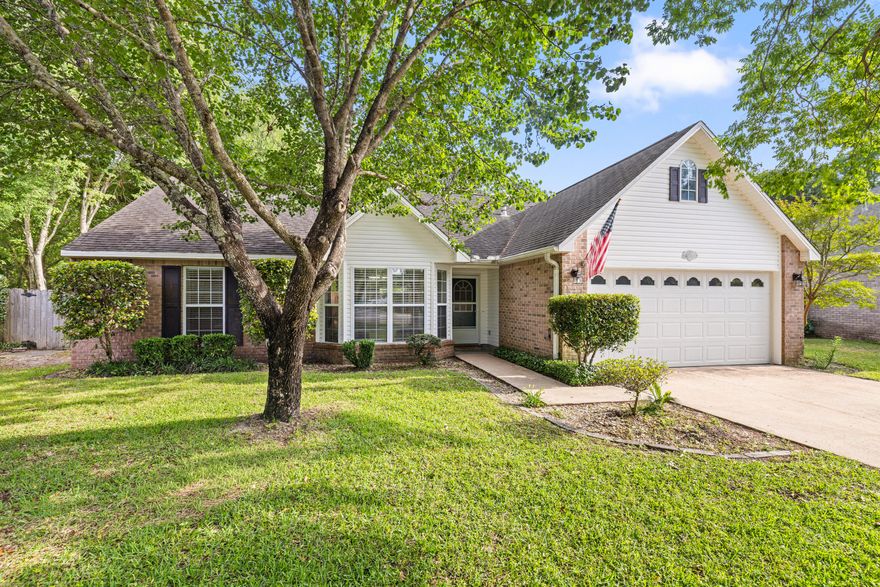 New roof to be installed prior to closing! Welcome to this beautiful 4BR/3BA home tucked away on a quiet cul-de-sac in the gated community of Parkwood Estates. Inside, brand new LVP flooring and fresh neutral paint create a bright, updated feel from the moment you walk in. The split bedroom layout provides both privacy and functionality, while the spacious living areas are ideal for everyday living.  The kitchen flows seamlessly into the main living area and features a bright breakfast nook overlooking the backyard.  Master bedroom is conveniently located on the first floor, along with an additional bedroom and full bath.  A separate dining room and spacious living area, highlighted by corner gas fireplace, offer an inviting space for gathering and entertaining. Upstairs features two additonal bedrooms, a full bath, and a versatile landing area, perfect for a home office, study nook, play area or cozy sitting space.  Enjoy added privacy with reservation land bordering the side of the property. The spacious backyard is designed for outdoor enjoyment, featuring a large deck with pergola, string lighting, and a dedicated fire pit area, perfect for relaxing evenings or gathering with friends and family.  There's also plenty of space to add a pool, garden, or expanded living area. New roof to be installed in 2026, an updated electrical panel, and a 2016 HVAC and Water heater.  Ideally located within walking distance to Bluewater Bay Elementary School and just around the corner from a neighborhood park, plus convenient to shopping, dining, Destin's beautiful beaches and local amenities. Enjoy access to Eglin AFB, Duke Field, and Hurlbert Field. An exceptional opportunity to own in one of Niceville's most desirable gated communities.