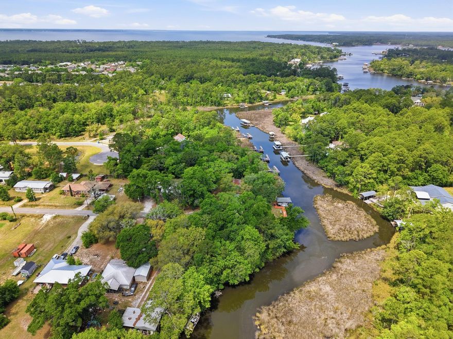 Waterfront lot (actually it is two recorded lots) located on quiet street located of of Hwy 331 and south of Hwy 20.  Just minutes to Hwy 30A or Freeport.   Great for the fisherman or leisure boater. If looking to be on the water this is one to consider.