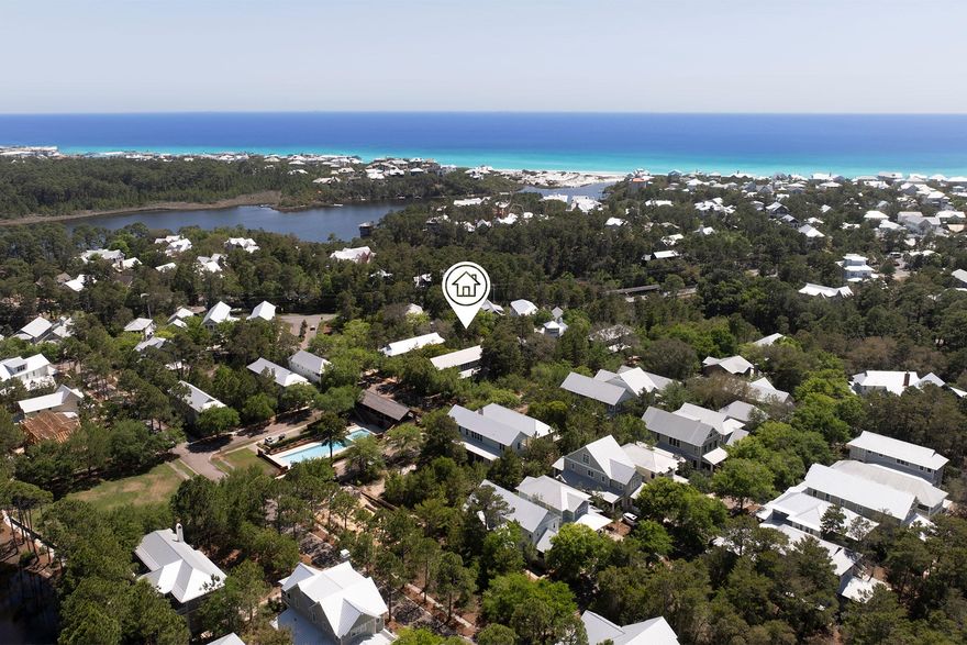 Located within the private, gated community of Forest Lakes along Scenic 30A, Lot 54 Okeechobee W offers an outstanding opportunity to build in one of the area's most sought-after neighborhoods. This homesite comes with plans for a thoughtfully designed residence featuring four bedrooms, three and a half bathrooms, 2,397 square feet of climate-controlled space, and a total living area of 3,146 square feet. Ideally located just a short stroll from the community pool and park, the lot provides a balance of convenience and tranquility. Less than a mile from Gulfview Heights Regional Beach Access, residents can easily reach the pristine white-sand beaches and breathtaking emerald Gulf waters. Positioned at one of the highest elevations along the coast, the neighborhood offers a serene and elevated lifestyle. Forest Lakes is renowned for its charming Southern Craftsman-style homes and outstanding amenities, including a two-tiered resort-style pool, a lakeside pavilion with an outdoor kitchen, and a stocked catch-and-release fishing lake. With meandering walking trails and abundant green spaces, the community fosters a connection to nature while maintaining a peaceful atmosphere. Consisting of only 150 homesites and bordering the scenic expanse of Point Washington State Forest, Forest Lakes offers an exclusive blend of privacy, natural beauty, and accessibility to everything 30A has to offer.