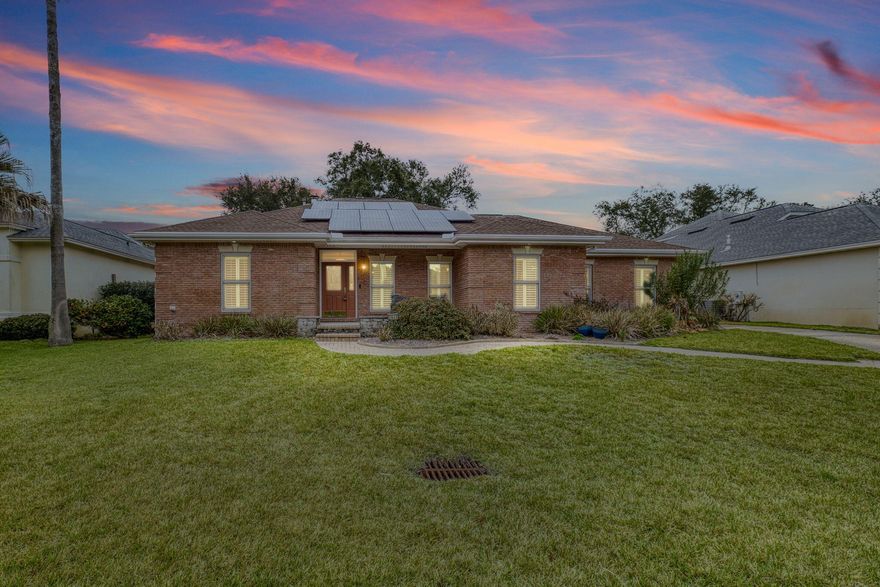 Welcome to this beautifully maintained brick residence offering 3 bedrooms, 3 full bathrooms, and approximately 2,498 square feet of thoughtfully designed living space, ideally situated on a spacious 0.22-acre lot. A recent home inspection has been completed, with all noted items professionally addressed, providing added peace of mind for the next owner.

From the moment you arrive, you are greeted by a large, inviting front porch and well-manicured landscaping that create warm curb appeal. Inside, the home features a functional and versatile floor plan with generously sized rooms and a seamless flow--perfect for both everyday living and effortless entertaining. Light, neutral tones throughout enhance the bright and airy feel of the interior. >> The kitchen is a standout, showcasing gorgeous countertops, a stylish accent backsplash, and custom cabinetry, all designed to blend beauty and practicality. Elegant crown molding runs throughout the home, adding a refined finishing touch.

At the rear of the home, an oversized sunroom provides a wonderful transition to the backyard, offering flexible space for relaxing, gathering, or enjoying views of the outdoors year-round. Step outside to find both a covered patio and an open patio area, ideal for entertaining, grilling, or even additional parking if desired.

The manageable yard offers the perfect balance of outdoor enjoyment without the burden of extensive upkeep, making this home as practical as it is comfortable. This property combines timeless construction, thoughtful updates, and flexible living spaces--ready to accommodate a variety of lifestyles.