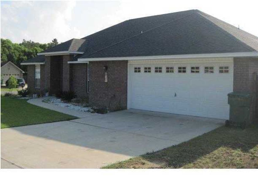 Come see this all brick 4 bedroom, 2 full bath home in Lee Farms. The HOA maintains the integrity of the neighborhood but fees are only $100 annually! The welcoming open floor plan draws you into the great room featuring sliding glass doors leading to an open patio and large fully fenced backyard. An eat-in kitchen with breakfast bar has stainless steel appliances, warm wood cabinets and granite counter tops. The spacious primary suite includes a walk in closet as well as en-suite bath with soaking tub, separate shower and double vanities. The home has all laminate and tile flooring throughout, no carpet!