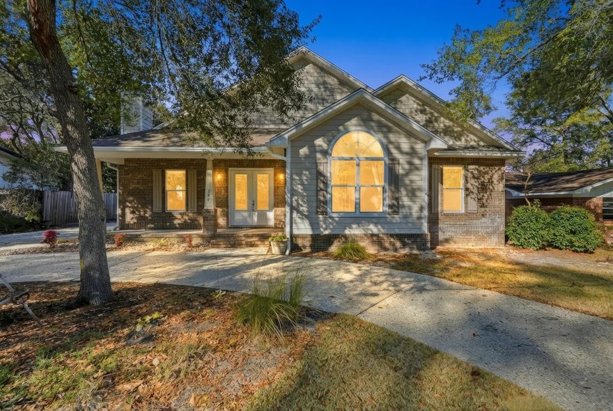 Potential to be a FIVE bedroom home! Designed for flexibility, comfort, & longevity, this custom-built home offers the potential for up to five bedrooms,, w/ both a dedicated office a spacious bonus room that can easily function as additional bedrooms, guest space, or multi-use flex rooms. Lightly lived in & meticulously maintained. The must-see oversized 3-car garage is a standout feature, complete with a convenient half bath, making it ideal for hobbies, projects, storage, or future workshop potential. Step inside to soaring ceilings & thoughtful design throughout. The living room features 20'shiplap vaulted ceiling & a wood-burning fireplace, creating an inviting central gathering space. The primary suite continues the wow factor with a 16' vaulted ceiling, offering a true retreat feel Tile flooring runs throughout the main living areas, with carpeted bedrooms. An open, split-bedroom floor plan creates ideal separation between the primary suite & secondary rooms. 10' doors, spray foam insulation, & a tankless water heater reflect the quality & efficiency expected in a well-crafted custom home. Every window features impact glass with a lifetime warranty, providing peace of mind & long-term value. Abundant storage above the kitchen accessed in the attic on the second floor. There is additional storage accessed from pull down stairs in the garage, adds rare & highly functional space. Out back, enjoy outdoor living with a covered patio & built-in gas grill, perfect for entertaining or relaxed evenings at home. Location seals the deal just 1/10th of a mile from Florida Park, where you'll find a boat ramp, fishing dock, picnic pavilions, and playground, & only 0.9 miles to the East Gate of Eglin Air Force Base for an easy commute. A rare combination of versatility, craftsmanship, & prime location, this home is built to adapt to your needs today.