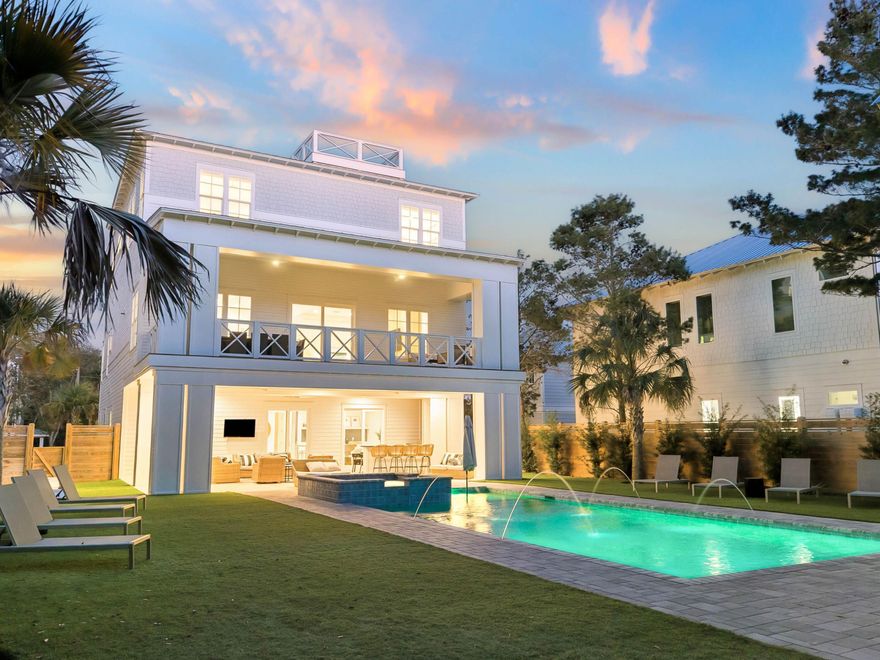 This coastal estate is positioned on a rare estate-sized homesite south of Scenic Highway 30A in the heart of Seagrove Beach. Blending modern coastal architecture with resort-level amenities, the property offers both an exceptional private retreat and a proven income-producing investment, generating $420,006 in rental revenue in 2025 alone. Spanning 6,057 square feet, the residence features six spacious bedrooms, six full and two half bathrooms, thoughtfully designed to accommodate both large gatherings and private escapes. Inside, clean architectural lines, curated finishes and expansive windows fill the home with natural light, creating an atmosphere that feels refined yet relaxed. Every detail reflects intentional design, balancing elevated materials with the effortless comfort expected of a premier 30A retreat. 

Outdoor living is equally compelling. The expansive grounds create a true private compound, anchored by a large resort-style pool, hot tub and dedicated pool house that enhances both convenience and entertaining. A private basketball court adds a rare recreation element, while multiple outdoor gathering areas invite relaxation throughout the day. One of the home's most captivating features is the rooftop terrace, where sweeping gulf views provide a dramatic backdrop for sunset gatherings and quiet coastal mornings. This elevated vantage point reinforces the home's connection to its surroundings, capturing the essence of Seagrove Beach living. Whether envisioned as a primary residence, second home, or investment property, 49 Brown Street represents a rare opportunity to own a newly built coastal estate with exceptional design, strong rental performance, and a premier south-of-30A location just moments from the gulf.