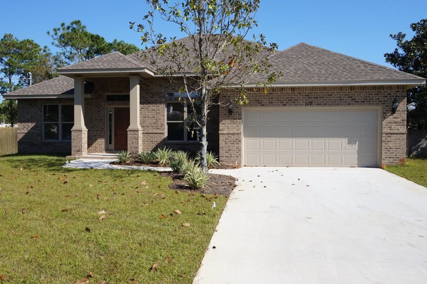 NEW CONSTRUCTION in Central Navarre~Luxurious 3 bedroom / 2 bath split floor plan will be completed in late June...Wonderful curb appeal and within easy access to the Waterfront Navarre Park and access to the Santa Rosa Sound and Sugar White Beaches~All brick exterior with accent craftsman columns and covered back porch. Impressive inside and out with custom attention to detail Soaring ceilings in the main living area. Large kitchen with staggered cabinets, crown, under mount sink, S/S appliances and beautiful 3cm granite countertops wrap around hop up bar with open flow to the Great room with French doors out to the covered back porch to have a complete outdoor living space to sit and enjoy those wonderful Florida evenings. Engineered Wood flooring in the main living area /foyer and large tile in the kitchen and all wet areas. Trey ceiling and crown molding in the Master ~custom walk in 5 ft. tiled shower with granite double vanity and antique bronze fittings. Additional bedrooms are carpeted, good size rooms with large closets and ceiling fans, separate laundry room ,oversized double garage with 8ft garage door ,front and back covered porch are a few of the features of this home. Situated on a large  lot with grassed yard~Well and irrigation system for easy maintenance in the summer months,  Central location offers easy access onto Hwy 98 and close to the Navarre Beach Bridge and local stores, short driving distance to Hurlburt. PICTURES ARE OF A SIMILAR HOME AND COLORS MAY VARY.