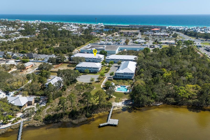Miller's Landing is ready to welcome you home! Located on one of the world's largest Coastal Dune Lakes, Lake Powell, this hidden and private gem offers the best of both worlds, lakefront living with an easy golf cart ride to beaches, dining, and shopping. Or go by water... kayak, paddleboard or boat to the Gulf and Camp Helen State Park off the private community dock. There is also a public boat ramp that is perfect for launching larger boats and jet skis into Lake Powell. The lake front pool is a refreshing way to start or end the day with unparalleled views. Come on in... a fantastic setup offering three private suites, spacious living and more storage than you will need... and all in pristine condition. Two guest suites on the first floor with private patios, laundry room, large storage closet and garage. As you approach the primary floor you are welcomed with an abundance of natural light, a large porch with a view of Lake Powell and open concept living/kitchen/dining. The oversized owner's suite has a walk-in closet and a dedicated linen closet. Miller's Landing is a charming and quaint community with 25 residences and a healthy mix of full time and second home owners. Another fun amenity is the private gate that provides access to the Publix shopping center. This is the perfect investment to enjoy all that 30A and our beautiful Gulf front walkable towns have to offer and then retreat to the serene environment Miller's Landing offers. Where else can play outside year round? We have more than the World's Most Beautiful Beaches...hiking and biking trails with dedicated camp sites in our state parks, explore all 15 Coastal Dune Lakes, pristine golf courses, fishing, court sports, shopping, art classes... the list goes on. Just come experience it for yourself and own your piece of our Paradise.