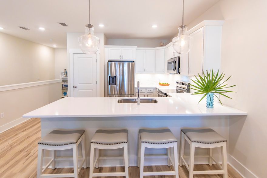Miller's Landing is ready to welcome you home! Located on one of the world's largest Coastal Dune Lakes, Lake Powell, this hidden and private gem offers the best of both worlds, lakefront living with an easy golf cart ride to beaches, dining, and shopping. Or go by water... kayak, paddleboard or boat to the Gulf and Camp Helen State Park off the private community dock. There is also a public boat ramp that is perfect for launching larger boats and jet skis into Lake Powell. The lake front pool is a refreshing way to start or end the day with unparalleled views. Come on in... a fantastic setup offering three private suites, spacious living and more storage than you will need... and all in pristine condition. Two guest suites on the first floor with private patios, laundry room, large storage closet and garage. As you approach the primary floor you are welcomed with an abundance of natural light, a large porch with a view of Lake Powell and open concept living/kitchen/dining. The oversized owner's suite has a walk-in closet and a dedicated linen closet. Miller's Landing is a charming and quaint community with 25 residences and a healthy mix of full time and second home owners. Another fun amenity is the private gate that provides access to the Publix shopping center. This is the perfect investment to enjoy all that 30A and our beautiful Gulf front walkable towns have to offer and then retreat to the serene environment Miller's Landing offers. Where else can play outside year round? We have more than the World's Most Beautiful Beaches...hiking and biking trails with dedicated camp sites in our state parks, explore all 15 Coastal Dune Lakes, pristine golf courses, fishing, court sports, shopping, art classes... the list goes on. Just come experience it for yourself and own your piece of our Paradise.