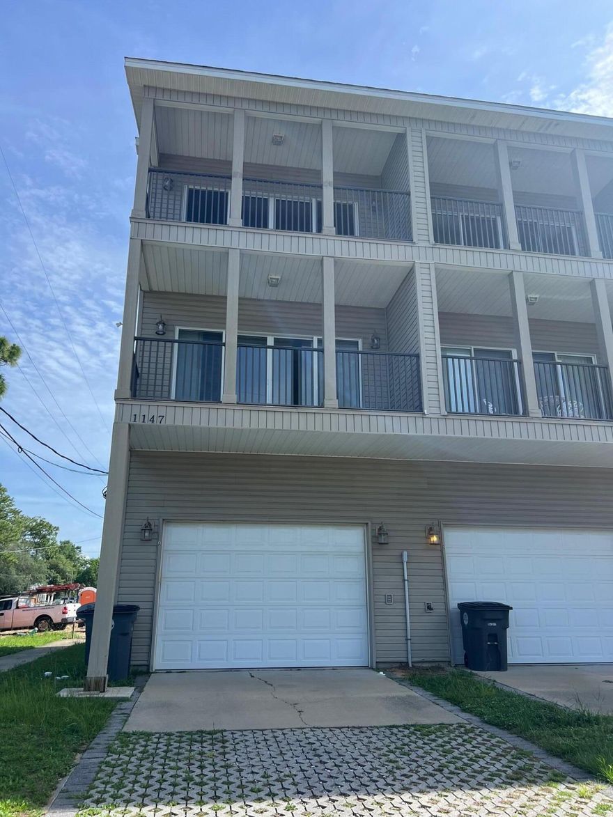 Waterfront living in Valparaiso! This beautiful 2-bedroom townhouse overlooking Tom's Bayou offers the perfect mix of comfort and convenience--just minutes from Eglin AFB's East Gate! Enjoy an oversized one-car garage with automatic opener, tons of closet space, and a full-sized washer & dryer. The real showstopper? Two private balconies with stunning bayou views--one off the living room and one off the primary bedroom. The kitchen is fully equipped with stainless steel appliances, including a fridge, dishwasher, stove, and built-in microwave.

Tenant responsible for utilities. Pets considered with a non-refundable pet fee.

Wake up to water views every day--this one won't last long!