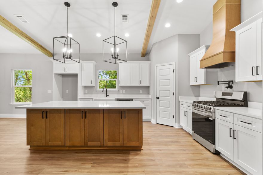 Situated on an oversized lot just under ¾ of an acre, this brand-new, semi-custom Craftsman-inspired home offers the perfect blend of timeless design and modern luxury. With nearly 2,000 square feet of thoughtfully designed living space, this 4-bedroom, 2.5-bathroom residence provides room to grow, entertain, and enjoy everyday comfort. From the moment you step inside, you'll notice the custom cypress wood beams and soaring vaulted ceilings that create warmth and character throughout. The chef-inspired kitchen is both stylish and functional, featuring tall cabinets, a gas range, and a tankless hot water heater--ensuring endless convenience for the busy modern lifestyle. Your primary suite is designed as a private retreat, complete with a free-standing soaking tub and a beautifully tiled shower, offering a spa-like experience right at home. With the added benefit of a tankless water system, you'll never have to worry about running out of hot water. What truly sets this property apart is the opportunity to make it your own. Choose from a wide variety of flooring options, quartz colors, and cabinet finishes to customize your home to match your style something you won't find in most builder-grade homes. This home is brought to you by a family-owned builder that takes pride in crafting homes with heart. With a focus on quality, integrity, and personalized service, they ensure every detail reflects a commitment to excellence. Bonus: You can even tour this same floor plan in another neighborhood to see the design come to life before making it yours. (Please note: Photos shown are stock images from similar homes actual finishes will vary based on your selections.) Don't miss your chance to own a semi-custom home on a rare, oversized lot in the fast-growing Cantonment area. This is more than just a house it's a place to create memories for years to come. Estimated closing time is middle of April, 2026.