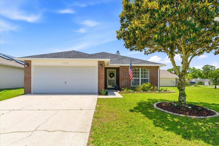 Welcome home to this beautifully refreshed, move-in-ready gem in the heart of Navarre! Situated on a spacious corner lot, this charming home offers the perfect combination of comfort, style, and convenience. Fresh paint throughout, a pressure-washed exterior, refreshed landscaping and a 2024 Roof/HVAC, 2022 Hot Water Heater means all the hard work has already been done for you.

Inside, you'll find timeless tile in the main living spaces and LVP flooring in the bedrooms (no carpet), soaring ceilings, a fireplace, a massive bar and an open floor plan designed for both everyday living and entertaining. The spacious living area flows seamlessly into the dining and kitchen space, creating the perfect gathering place for friends and family.

The primary suite is a private retreat featuring double-door entry, a large walk-in closet, dual vanities, a soaking tub, and a private water closet. Start your mornings with coffee on the screened porch and unwind in the evenings by the cozy fireplace.

No HOA! Resting on approximately 0.19 acres, the corner lot offers plenty of outdoor space and the potential for boat or RV parking. Centrally located just minutes from Navarre's sugar-white beaches, shopping, dining, schools, and local favorites, this home puts the best of the Florida lifestyle right at your doorstep.

Whether you're searching for a primary residence, second home, or investment property, this move-in-ready beauty is one you won't want to miss. Schedule your private tour today