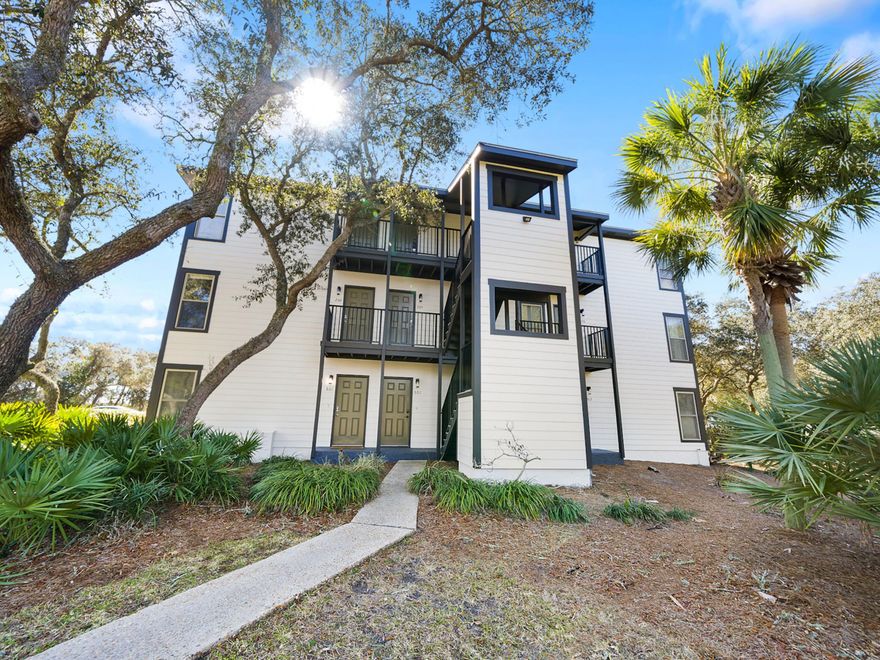 Salt & Light offers the quintessential coastal retreat, fully remodeled in 2024-2025 with modern finishes and a thoughtful layout that sleeps like a two-bedroom. The hallway bunks are tucked behind a door and outfitted with privacy curtains, while a queen sleeper sofa adds flexibility for extra guests. Inside, the open-concept living area is both inviting and functional, with all-new flooring, updated kitchen and bath, fresh trim, new appliances, and a bright, airy atmosphere that encourages relaxation.

The private balcony, shaded by live oaks, provides a tranquil perch overlooking the community pool. Set within a gated, boutique-sized complex with grilling station and dedicated parking, this condo is directly across from Orange Street Beach Access -- just 20 steps to the boardwalk!