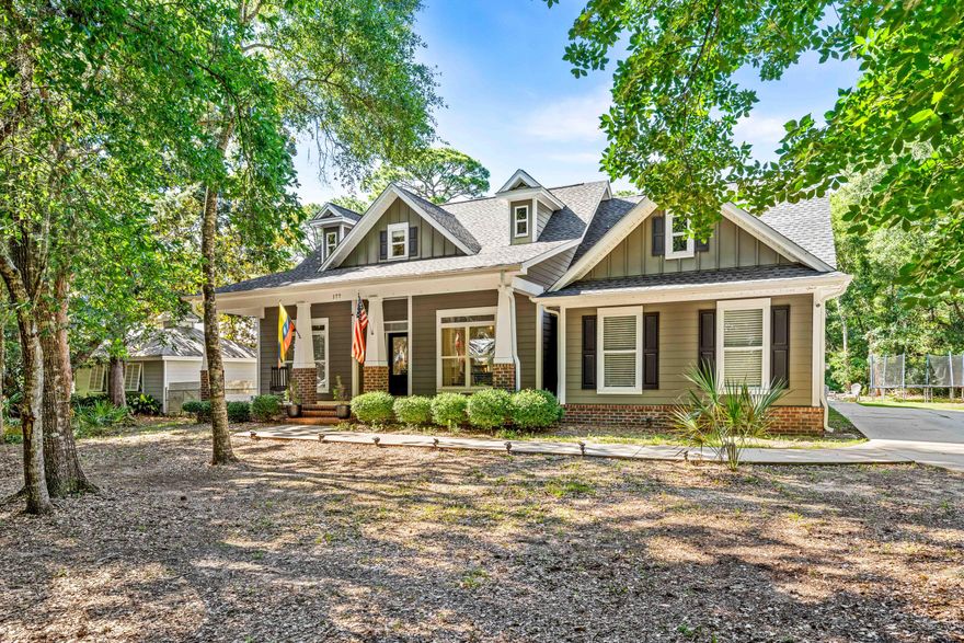 New Roof (2022). New HVAC (2025). All New Plumbing (2025). Custom-built forever home. (Attention Veterans!! Assumable VA rate, 2.75%, see page 3 in pics).

Located in one of the most beautiful private cul-de-sacs in SRB with only 27 home sites. The street is filled with Florida cottage charm, defining ''Old Florida.''

The home includes a bonus room, an oversized front porch, gorgeous columns, and low maintenance hardy plank siding. 10' smooth ceilings, deep crown molding, custom cabinetry, granite countertops, and built-in bookshelves are just a few of the many upgrades. The upstairs is finished out to be the ultimate playroom for the kids, extra sleeping, or office space. The backyard is primed and ready for a pool or garage.