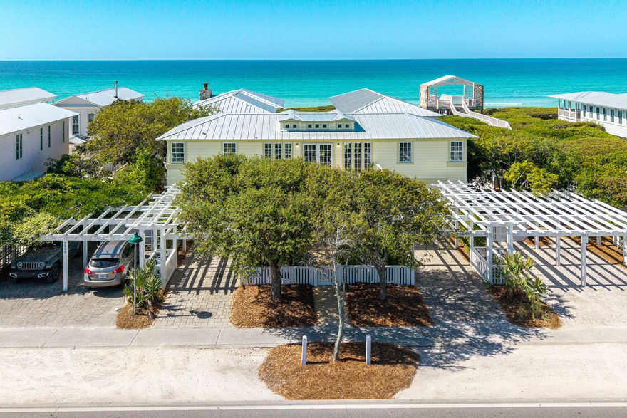 Experience the rare opportunity to own the only current available home south of 30A in the world-renowned community of Seaside, Florida. This beautiful family home offered for the first time by the family who were the original builders and has been lovingly cared for and continuously updated since its construction. A coastal masterpiece with spectacular Gulf views designed for effortless entertaining. The second level features two spacious porches that seamlessly extend the living and dining areas to the outdoors. The heart of the home is the chef's kitchen, where a 4-seat breakfast bar invites family or guests to gather while picnic lunches are prepped for a fun filled day at the beach. For quieter moments, retreat to the first-level media room for a movie night. The home's generous  layout includes six bedrooms, highlighted by three luxurious king suites, and 6 full baths. Practical coastal living is built-in with a large storage area for all your beach gear and a refreshing outside shower to keep the emerald sand where it belongs. Located just steps from one of 8 private HOA beach accesses and featuring two private carports with a total of 4 parking spots. This is the ultimate Emerald Coast retreat to start making your family's beach adventures for many years to come. A few recent updates include new roof, impact rated windows and doors, new exterior siding, all decks and handrails replaced, painted inside and out, floors refinished, new window treatments, updated bath off kitchen, new landscaping.