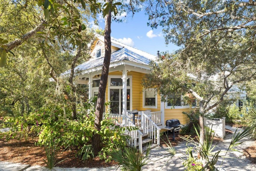Just 1 Minute to the Sand - Iconic Seaside Cottage on Tupelo Street

Welcome to Dreamsicle, a charming, fully renovated 2-bedroom beach bungalow tucked into the heart of the coveted Seaside, Florida community -- just one minute from the idyllic Tupelo Beach Pavilion. 

With high ceilings, light-filled living spaces, retro-chic appliances, and a front porch overlooking the shaded Rosewalk Park, this is coastal living at its finest.

With open living + dining + kitchen floor plan designed for beach-life ease, this 2016 Southern Living Style featured home is ready for your family.

The kitchen features modern quartz counters, custom cabinetry, Italian Bertazzoni 4-burner stove/oven, and a retro Smeg fridge for cool chic living.