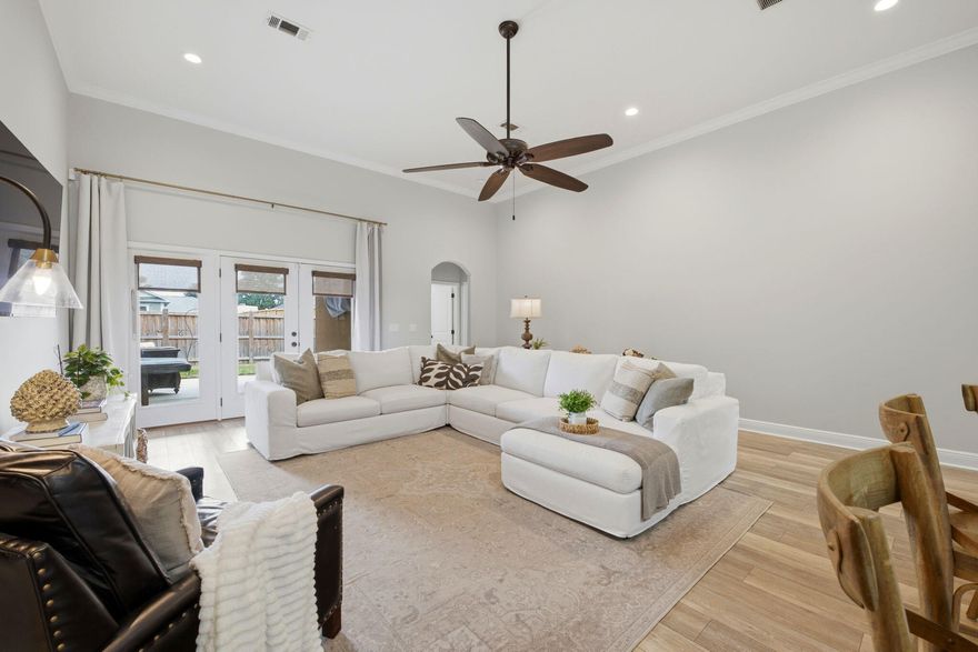 Welcome to one of East Navarre's most prestigious gated Mediterranean-style communities--where coastal living meets timeless architectural charm.

PALMETTO LAKE PRESERVE 

As you enter the neighborhood, you'll immediately notice the beautifully designed Mediterranean homes, underground utilities, and elegant street lighting that guide you through the community's peaceful streets. The neighborhood is thoughtfully designed with two quiet cul-de-sacs leading toward the Sound, creating a serene setting just moments from the water. Perfectly located in highly desirable East Navarre, this community offers quick access to top-rated schools, shopping, dining, and an easy commute to Hurlburt Field Air Force Base. Enjoy the convenience of being less than 30 minutes from Destin, while still appreciating the relaxed lifestyle and value Navarre is known for--without the resort pricing.

This one-owner home, built in 2014, has been exceptionally maintained and reflects quality craftsmanship throughout. As you step inside, you'll be greeted by soaring ceilings and an open, airy layout that immediately makes the home feel spacious and inviting.

The home features four full bedrooms and three full bathrooms, offering plenty of flexibility for families, guests, or home office space. The kitchen is designed for both everyday living and entertaining, overlooking the main living area and featuring an oversized bar-top island with updated white quartz countertops. All kitchen appliances convey with the home for added convenience.

Additional updates include new flooring in several areas, enhancing the home's fresh and modern appeal. Step outside to enjoy the fully fenced backyard, perfect for pets, outdoor gatherings, or simply relaxing in your private outdoor space.

One of the most special features of this community is its Sound-side access and neighborhood beach area. Take a short stroll with family or pets to the end of the cul-de-sac where residents can enjoy peaceful waterfront views and the beauty of the Emerald Coast. Whether you love boating, fishing, kayaking, paddleboarding, or simply soaking up the coastal breeze, this neighborhood allows you to enjoy it all without ever leaving your community.

Finding a home with this level of care, location, and neighborhood amenities under 2,300 square feet at such an attractive price point is a rare opportunity.

Join us at one of our upcoming Open House events and come experience this exceptional coastal community for yourself.