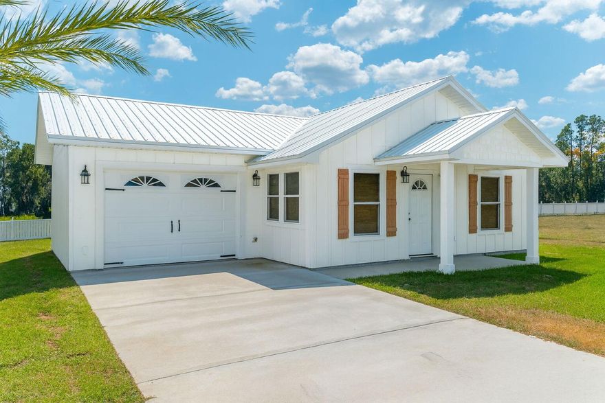 HERE is your BRAND-NEW house to call home!!! Amazing 3-bedroom 2-bath open floor plan concept home located in Jackson Shores! This great floor plan offers all laminate flooring, granite countertops, along with great appliances and a metal roof! Alabama allows you the opportunity to buy with lower insurance premiums and lower taxes! This home is low maintenance and has all the upgrades you are looking for in new construction to include amazing kitchen cabinets and granite countertops and offers an open dining/living concept adding to the openness of the home perfect for entertaining. Home offers a great back porch located in the rear of the home that opens to the back yard and includes a 1 car attached garage! Call today to see this GREAT rental! Overlooking Lake Jackson