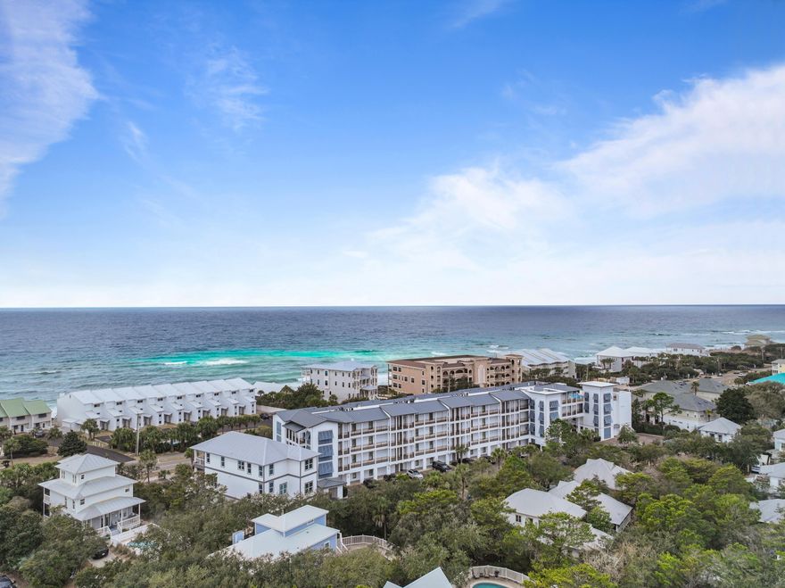 Located in the boutique Waterhouse Condominiums along Scenic Highway 30A, this 3BR/3BA residence offers 1,836 sq ft just steps from the Gulf. The open layout features a spacious living and dining area with natural light and access to a private patio. The kitchen includes premium finishes and ample storage. The primary suite offers a private bath with double vanities and walk-in shower, while two guest bedrooms have access to full baths. Ground-floor placement allows easy access without elevator use. Amenities include deeded beach access, rooftop pool and spa, fitness center, owners' lounge, and covered parking. Ideally located between Alys Beach and Rosemary Beach.