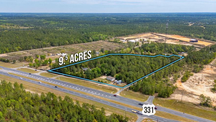 High and Dry in Flood Zone X with 576 feet fronting the ever-growing and popular commercial corridor of S. Hwy 331, a major artery feeding South Walton, Santa Rosa Beach, and the beaches of Hwy 30A.  Totaling 9.4 acres of opportunity with Estate Residential zoning, allowing for Residential or Commercial uses to include short term vacation rentals, agriculture related, veterinary, rural grocery or general store, feed sales, bait and tackle, hunting camp, recreational vehicle parks or campgrounds and more.  Less than 30 minutes (23 miles) from the famous Grayton Beach or 10 minutes from Interstate 10, with close access to major retail sites in both Freeport and Defuniak Springs.  A savy investor may potentially up-zone to Light Industrial, already done just three parcels north of the site.