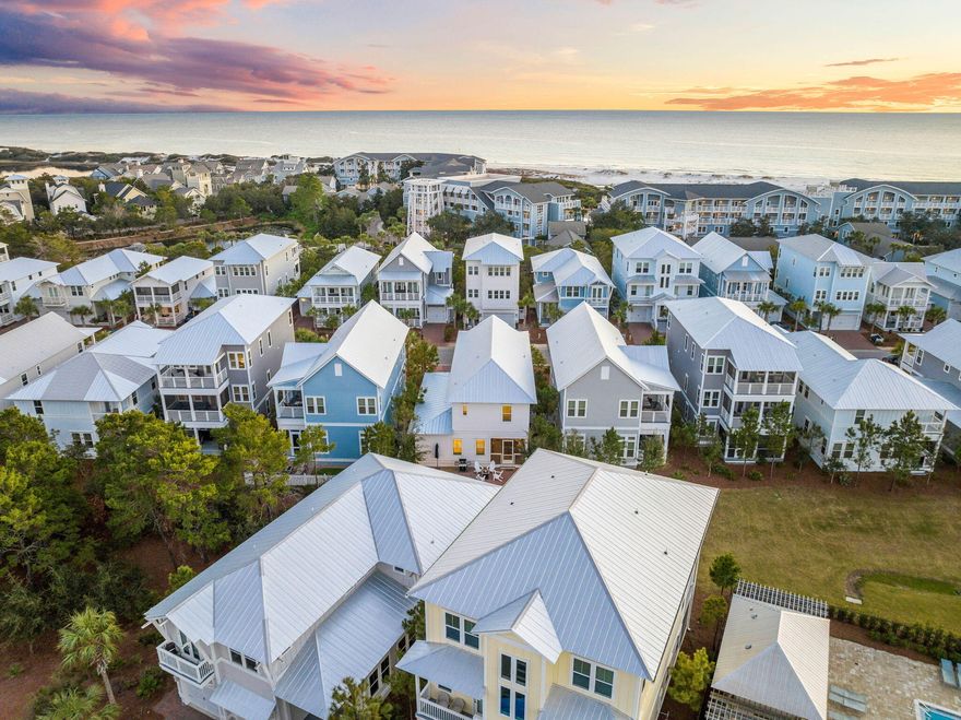 Welcome to 90 Siasconset Lane -- a beautifully designed 5-bedroom, 4.5-bath home nestled in the coveted Prominence community, south of 30A. Perfectly positioned just 100 yards from the Watersound Club entrance, a direct line of sight to the community pool, and rental projections over $131K annually, this home puts the best of Prominence right at your doorstep. This home is thoughtfully crafted, with its soaring high ceilings, and rich hardwood floors, the interior sets a tone of relaxed elegance from the moment you walk in. The open living spaces flow naturally to three outdoor porches -- including a screened-in retreat perfect for morning coffee -- and a charming paver garden out back complete with a firepit and room for al-fresco dining under the stars. The kitchen is built for real living, featuring updated dual fuel appliances and on-demand hot water, so you're always ready for everything from a quick beach breakfast to a full family dinner. The home's dual master suites offer privacy and flexibility, while two additional guest bedrooms and a dedicated kids' bunk room ensures everyone has their own perfect place to land. Prominent among Prominence's many charms are its golf-cart-friendly culture, a community pool, and the beloved Big Chill -- right in the neighborhood -- for easy family dining, shopping and entertainment. The expansive beaches of Deer Lake State Park are less than half a mile from your front door, waiting to be explored any time the mood strikes. With a one-car garage, parking for three more vehicles, twice-weekly trash pickup, and gated security, the details are handled so you can focus on what matters most -- living well on 30A. 90 Siasconset Lane isn't just a home. It's your family's favorite place on earth.