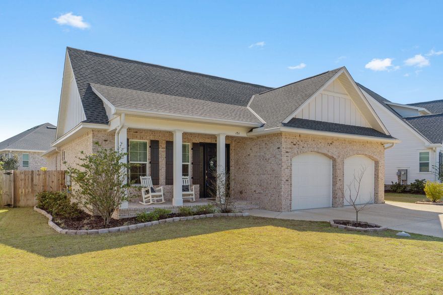 Built in 2023, this single-story home delivers the kind of thoughtful layout that just feels right from the moment you arrive. A sprawling open floor plan anchored by soaring 10-foot ceilings and three separate wings gives everyone their own space without sacrificing connection and a cohesive feel throughout.

The heart of the home opens up into a generous living, dining, and entertaining space. The kitchen is a standout, with quartz countertops, soft-close drawers, a generous island, and premium Bosch appliances including a gas range. 

Natural light pours in through clerestory windows in the kitchen and bathrooms, a lovely architectural detail. No carpet anywhere: luxury vinyl plank runs throughout the main living areas, with tile in all bathrooms and the full laundry room Frameless walk-in showers and a dedicated laundry room with sink and shelving round out the interior details with clean, timeless finishes.

The split floor plan is genuinely functional. The front of the house holds two bedrooms connected by a full bath. The opposite wing is anchored by the primary suite with spa-like bath and two closets! A fourth bedroom and third full bathroom is set just off of the kitchen. This home truly lives large, and even features a dedicated home office close to the primary. 

Out back, a screened enclosed porch opens to a flat, fully fenced yard with room to roam. The front of the home has a view of greenspace, and the covered front porch makes this one stand out.

The mechanical and utility details are equally dialed in: oversized two-car garage with EV charger, tankless water heater, impact-rated windows, irrigation system, gutters, and durable brick-and-Hardie board exterior.

Located in an established residential neighborhood zoned to Niceville High School and convenient to multiple military installations, this property is well-positioned and well-built. Must see!