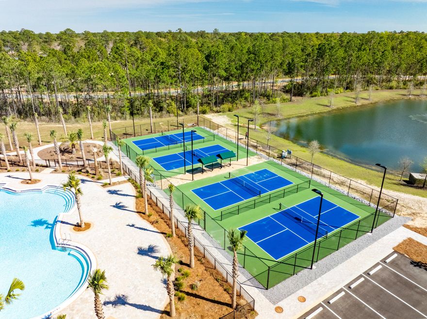 *** New construction tucked away on one of the larger lots in Bear Creek Cottages, just 10 minutes from the beautiful beaches, parks, restaurants, and golf courses of South Walton and 30A.
This stunning 3-bedroom, 3.5-bath home features an open floor plan with 12-foot ceilings and thoughtful, high-end finishes throughout. Highlights include keyless entry,  impact-resistant windows and doors, a durable metal roof, an oversized garage with additional storage, hardwood floors, vaulted ceilings, a cozy fireplace, and the master bath features luxurious soaker tub.
The chef's kitchen is designed for both everyday living and entertaining, complete with KitchenAid appliances, a gas cook top and a convection wall oven.
 The home offers two spacious porches wired for .... ceiling fans The front porch overlooks a charming fountain and manicured lawn, while the rear porch is equipped to mount a 80 inches TV--ideal for outdoor gatherings.
This impressive home is perfect for hosting family and friends while enjoying life in a highly sought-after planned community. Amenities include pickleball, tennis and basketball courts, a children's play area, fitness center, and an Olympic-style pool.
Don't miss this opportunity--BUY NOW ! Additional homes are available in Phase 2, offering options for everyone in this desirable community.