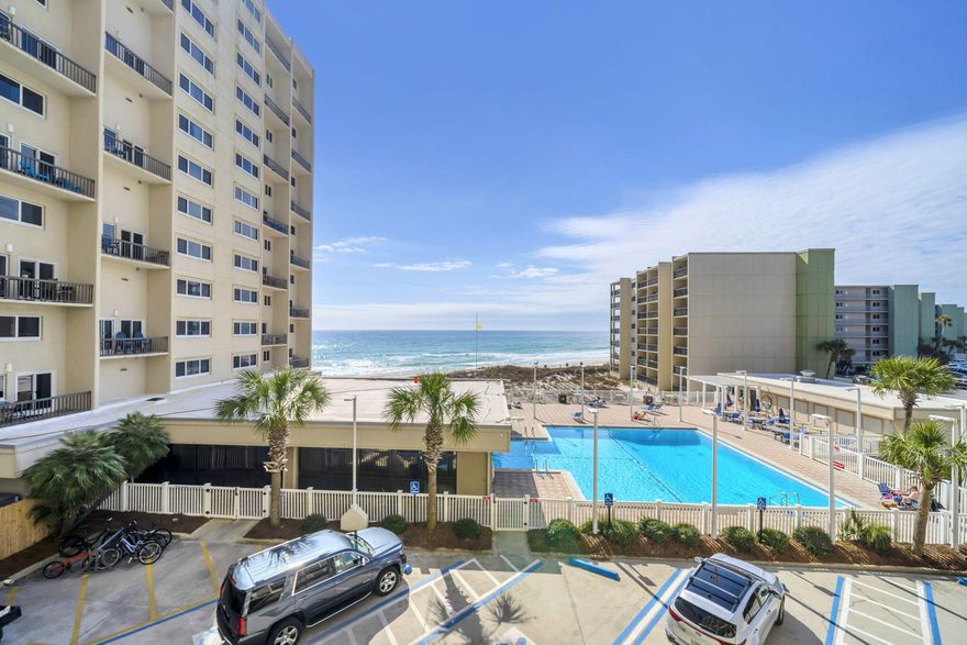 COMPLETELY RENOVATED AND SOLD FULLY FURNISHED - Welcome to Pinnacle Port!
Step inside and immediately appreciate the thoughtful upgrades and modern finishes found throughout this beautifully renovated unit, such as the LVP flooring that carries seamlessly from room to room, offering both durability and a clean, coastal look. The bedroom features tasteful barn doors that add charm and function, while the updated staircase and sleek railing elevate the overall aesthetic. One of the standout improvements is the transformation of the former half bath into a full second bathroom, complete with a stylish walk-in shower. On the first floor, the serene bedroom provides peaceful views overlooking Lake Powell, an ideal way to begin and end your day. Head upstairs to the second level where the dining and kitchen areas continue to showcase those tranquil lake views. The kitchen is outfitted with quartz countertops, stainless steel appliances, a casual breakfast bar, and plenty of cabinet space, making it as functional as it is attractive. Additional convenience comes with the in-unit washer and dryer.

The main living area is bright and welcoming, opening out to a tiled balcony that offers unobstructed Gulf views along with a clear sightline to one of the community's pools. It's the perfect spot to relax, dine outdoors, or simply enjoy the coastal breeze. With its numerous upgrades, thoughtful layout, and stunning views from both levels, this fully renovated Pinnacle Port unit offers the ideal blend of comfort, style, and coastal living.

Pinnacle Port in Carillon Beach has so much to offer. With two pools, one of which is seasonally heated, a poolside cafe, field and court games as well as a playground, library and billiard room. You have access to a private boat ramp on Lake Powell with complementary boat slips for all your water activities. There is even a BRAND NEW PLAYGROUND currently under construction with anticipated completion of July 2026.  Pinnacle Port is also located in a gated community with 24/7 security. 

The prime location offers you easy accessibility to all of your needs. 30A and Rosemary Beach is less than 3 miles to the west with restaurants, shopping, and more. Pier Park is less than 10 miles to the east with so many entertainment options available year round. Only a 30 minute drive to the Northwest Florida International Airport!