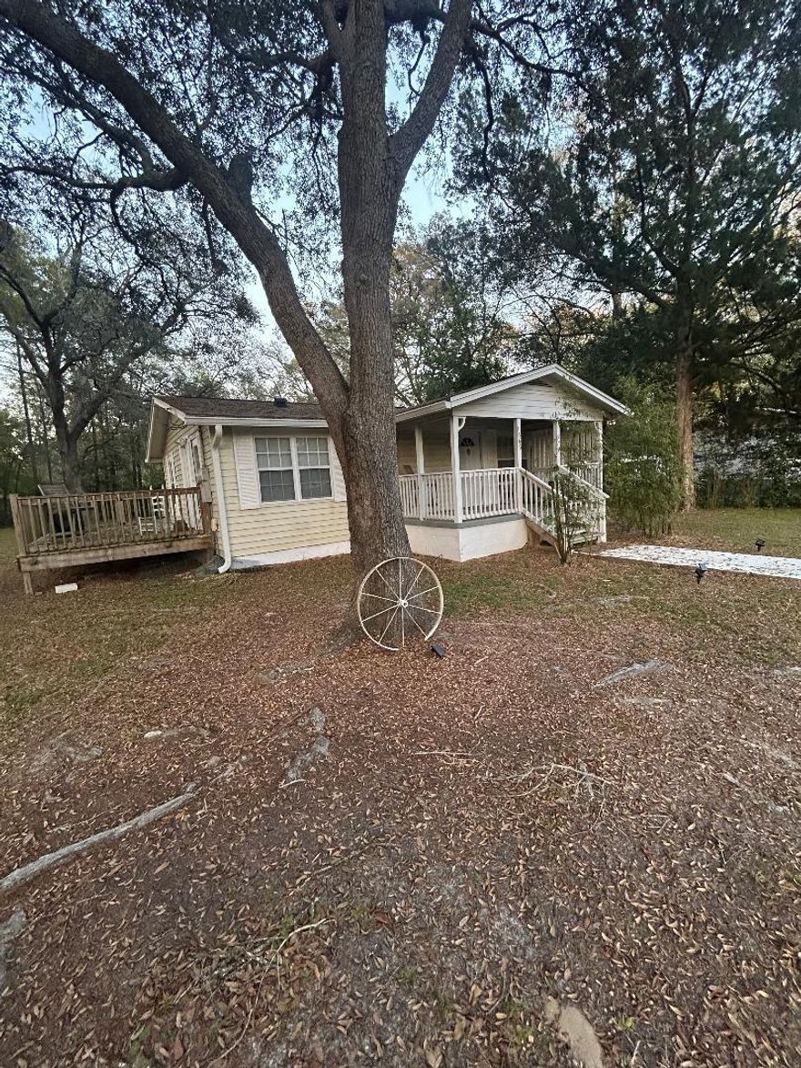 Cute cottage in city limits of Ponce de Leon fronting paved street.  Home has been totally renovated in a tasteful and professional manner.  Originally was a two bedroom, but one bedroom was converted into a laundry room.  Newer roof. Fully renovated two years ago including new roof, porch and deck, mini split unit, modern kitchen and much more.  Living room has open air ceiling with attention to detail including woodwork in ceiling and wood new floor covering.  The eat in kitchen has new appliances, center bar with stools, tiled backsplash and new cabinets. Appliances & furnishings included.  Bathroom tastefully remodeled with new fixtures. This home could be your next AirBnb, or your home away from home. Located in Holmes county but yet a short drive to beaches or shopping.