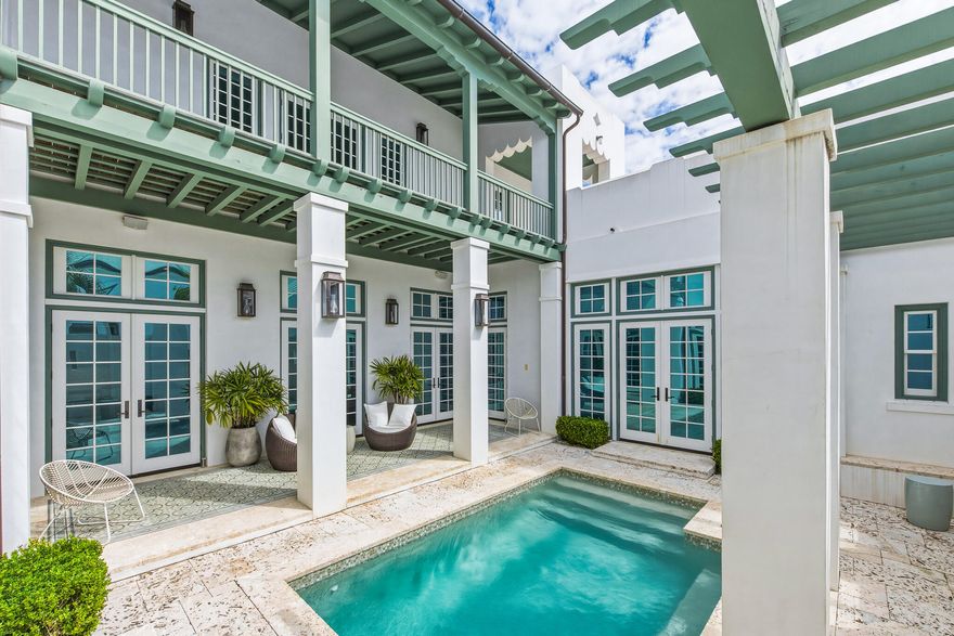 Discover coastal sophistication at 36 Sea Star Court in Alys Beach, where Jason R. Dunham's architectural brilliance captures the essence of luxury living. Ideally situated at the intersection of the Turtle Bale Pedestrian Path and the east-west pedestrian corridor, this stunning corner residence welcomes you with an abundance of natural light, creating an enchanting ambiance from the moment you step inside.

Spanning 3,773 square feet, this home features two elegantly appointed bedrooms on the main level, including one of the two lavish primary suites. The second primary suite, located on the upper level, opens to a breathtaking rooftop terrace--an ideal setting for starlit entertaining.

Designed around a stylish outdoor courtyard, the property boasts a generous swimming pool and a  covered loggia, perfect for relaxation and family gatherings. The great room captivates with soaring double-height ceilings and an inviting gas fireplace, exuding warmth and elegance. The gourmet kitchen is a chef's dream, equipped with a 48-inch Wolf range, a spacious pantry, and seamless access to a large dining room that overlooks a serene courtyard adorned with a tranquil garden, soothing fountain, and outdoor summer kitchen.

Thoughtfully crafted with Dominican Shellstone flooring on the first level and stunning stained oak on the second, each bedroom features en suite bathrooms with exquisite tile work and stone countertops, complemented by spacious closets. This home is not just a residence; it's an entertainer's paradise gifting the outdoor courtyard and swimming pool to your guests.

Homeownership includes access to the exclusive private owners' Beach Club. Don't miss the chance to own this extraordinary property--schedule your private tour today!