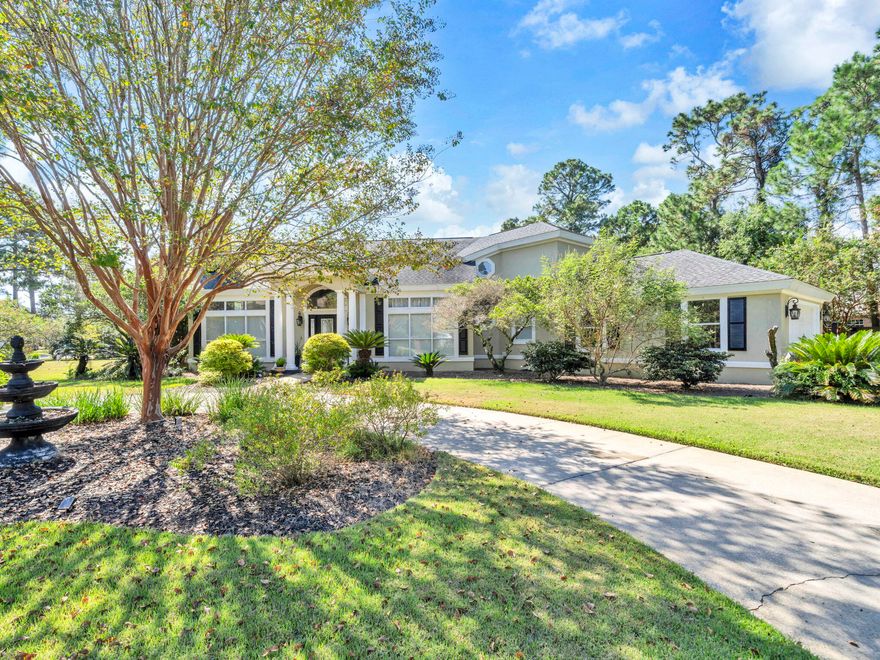 Move in ready 4-bedroom 3 bath home in the gated community of Southwind in Bluewater Bay.  The remodeled kitchen has granite counter tops, wood cabinets, stainless steel appliances, walk-in pantry, & island with storage.  The family room is right off the kitchen for open concept living.  The living room has high ceilings, a fireplace, curved staircase to the second floor and is  open to the large dining room. There is custom trim work throughout the home. In addition, this fabulous home has a screened in porch with outdoor kitchen area, and a heated and cooled Florida room on the first level.  3 bedrooms up including spacious primary and 2 renovated baths up, 2 car attached garage, circular drive, laundry room with sink. Large corner lot with firepit, pergola and beautiful plantings with plenty of room for a pool. Bluewater Bay has a pool right around the corner along with golf, tennis and pickleball.