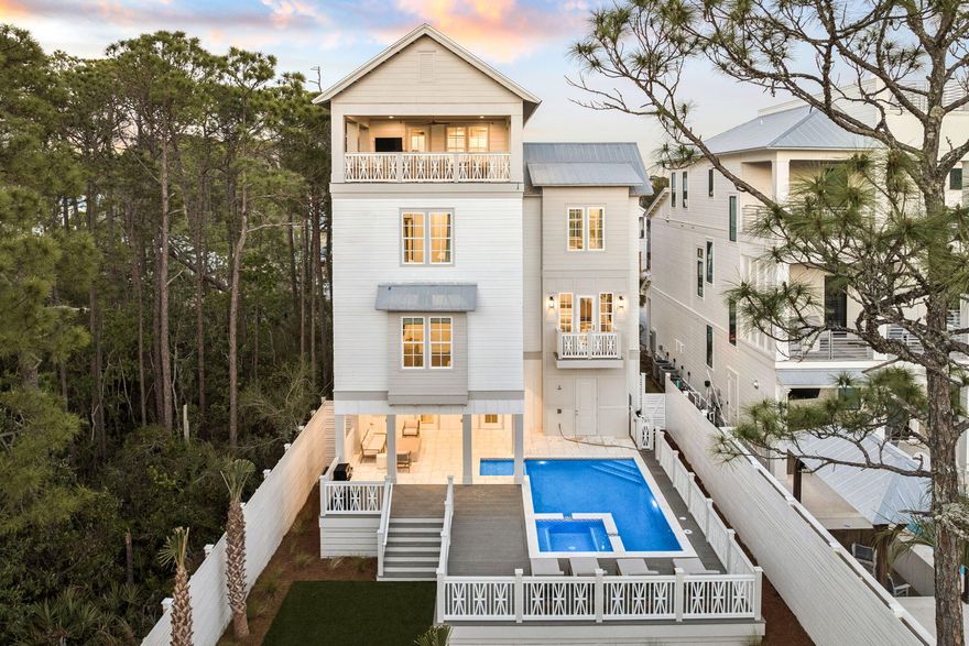Properties of this caliber and design are exceptionally rare in this pocket of Old Seagrove, offering a unique opportunity to own a refined, modern coastal residence just moments from the Gulf and the charm of 30A's most beloved destinations. Positioned for both lifestyle and investment, 81 Montigo Avenue delivers a seamless blend of thoughtful architecture, elevated finishes, and strong rental appeal in one of the area's most desirable location.

Built with a focus on clean lines and timeless coastal elegance, the home balances warmth and sophistication throughout. Wide-plank hardwood flooring, luxury furniture, and carefully curated materials create a cohesive, high-end aesthetic, while expansive windows invite in natural light and blur the line between indoor and outdoor living. Designer lighting and subtle architectural details add depth without overwhelming the space.

The kitchen is designed to anchor the home, featuring custom cabinetry, premium appliances, and an oversized island that effortlessly accommodates both intimate gatherings and large-scale entertaining. It opens seamlessly into the main living area, creating a natural flow ideal for hosting and everyday living alike.

Generously scaled bedrooms and multiple living spaces provide flexibility for both personal use and rental optimization. The primary suite offers a quiet retreat with a spa-inspired bath, complete with dual vanities, a soaking tub, and a glass-enclosed shower. Additional guest accommodations, including a dedicated bunk space, allow the home to comfortably host large groups while maintaining privacy and comfort.

Outdoor living is equally compelling, with a private pool designed for both relaxation and entertainment, complemented by covered lounging areas that extend usability throughout the year. Upper-level terraces capture coastal breezes and provide the perfect setting for evening gatherings.

With its rare combination of location, scale, and design, 81 Montigo Avenue stands out as a compelling opportunity for those seeking a primary residence, second home, or high-performing investment along 30A.