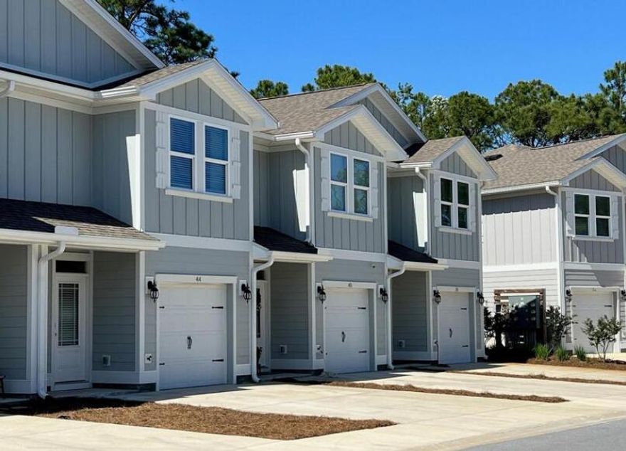 ALL UTILITIES INCLUDED! Located off Mack Bayou Road is just minutes to Grand Blvd and Scenic Hwy 30A. This interior 3 bed, 2.5 bath townhome has EVP flooring throughout the entire home, excluding the stairs and all bedrooms, which have carpet. Elegant 9' ceilings, granite countertops and ivory colored shaker style cabinetry with brushed nickel hardware are a few of the added details.