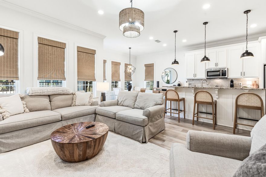 Fully renovated and move-in ready, this exceptional 4BR/4BA Villa Lago residence completed a full interior renovation in 2025 and delivers turnkey living with style, functionality, and value.

The main level features light, premium LVP flooring throughout the living areas and staircase, enhancing the bright, open feel of the home. Fresh neutral interior paint in Swiss Coffee, updated lighting, and designer finishes create a clean, modern aesthetic. A versatile main-level bedroom with a nearby full bath is ideal for guests or flexible living. The spacious living room offers ample room for entertaining and flows seamlessly to a private patio, perfect for morning coffee, evening cocktails, grilling, or casual gatherings. Cont'd The updated kitchen includes all-new 2024 stainless steel appliances including refrigerator, dishwasher, and range/oven. A renovated pantry with custom floating shelves provides modern, open storage while maintaining a sleek look.
Upstairs, all three bedrooms feature private en suite bathrooms with no shared baths. The primary suite is a true retreat with a large walk-in closet, (bonus room) ideal for a home office, sitting area, or nursery, mounted TV with concealed wiring, and a spa-inspired bathroom with separate shower and jetted soaking tub. A convenient upstairs laundry room adds everyday practicality.
Recent upgrades include HVAC replacement in 2020, water heater in 2025, washer and dryer in 2022, and a new motorized garage door opener in 2025. Additional interior improvements include LED recessed lighting, updated ceiling fans, Decora outlets and switches, contemporary black hardware, and new window treatments throughout.
The full garage features show-quality epoxy flake flooring with a durable polyaspartic topcoat and fresh paint. The exterior was recently soft-washed and painted crisp white, delivering standout curb appeal while remaining fully HOA compliant.
A rare value-add: the home is fully furnished with all-new 2025 furniture including beds, mattresses, dressers, nightstands, sofas, lamps, and décor. Simply bring your suitcase and move in.
This is a rare opportunity to purchase a fully renovated, completely furnished Villa Lago home without the delays, costs, or stress of renovations or furniture shopping. Ideal as a primary residence, second home, or investment property.