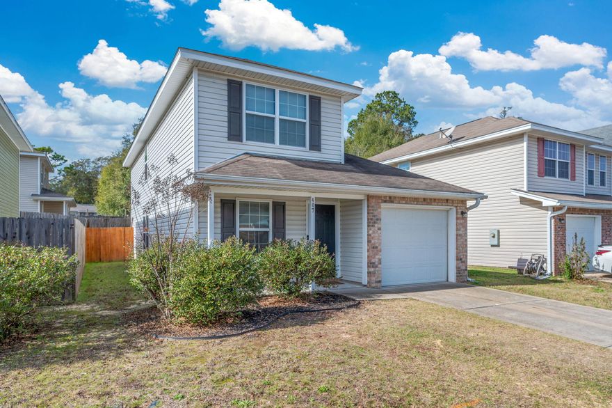 Sellers offering One year of HOA Fee and 1 year home warranty up to $600 to buyer upon a successful closing. Motivated sellers! This home has a lot to offer located in central Crestview with 4 bedrooms and 2.5 baths. The Main bedroom and a 1/2 bath located on the 1st floor makes for a convenient setup and a second bedroom on first floor, that would make for a great office space, workout room or a place to make into quiet space or for guests.Upstairs there are 2 bedrooms with a full bath plus a roomy loft area that makes a wonderful play area for children or game room. Open concept kitchen living area makes gatherings more enjoyable.HVAC 2022 and New water heater for peace of mind. Fully fenced backyard.
A one car garage with remote access included. AI staged furniture in Dining and living