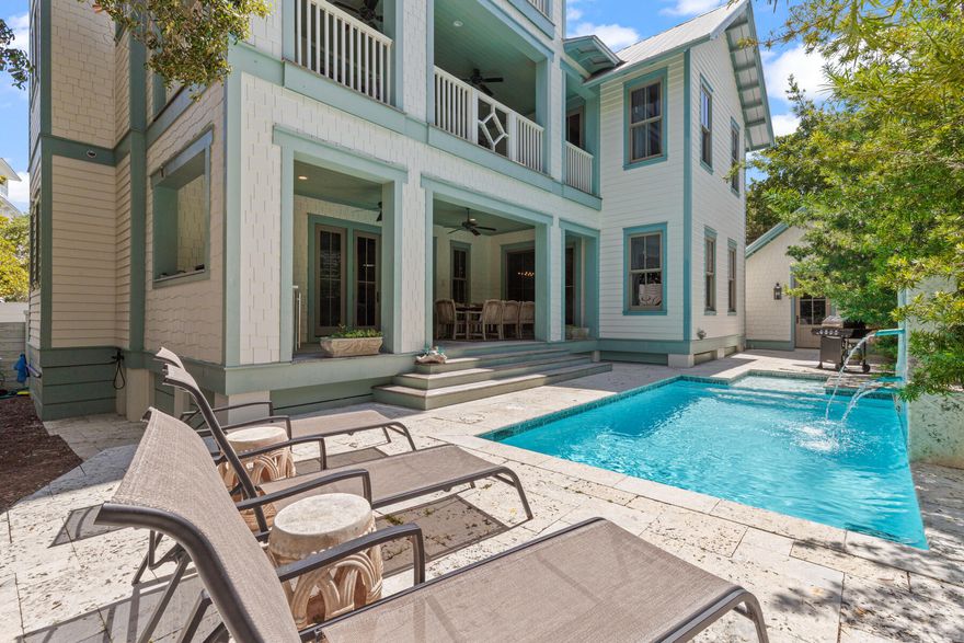 A timeless Old Seagrove retreat just steps from the Gulf, this spacious beach home offers the rare combination of classic coastal character, exceptional location, and outstanding rental potential. Nestled beneath mature trees on a quiet Seagrove street, the property sits just 350 feet from beach access and one block from Scenic Highway 30A, placing you within an easy walk or bike ride of Seaside and some of the most beloved dining and shopping along the Emerald Coast. Adding to its appeal, the property benefits from no HOA dues, a rarity in this highly desirable area.

Inside, the home blends warm architectural details with relaxed coastal design. Beamed pecky cypress ceilings, white oak floors, and crisp shiplap walls create an inviting interior that feels both refined and comfortable. Natural light fills the open-concept living and dining areas, while the spacious kitchen with premium appliances and generous seating is designed for gathering after long days at the beach.

Spanning three levels of living space, the layout offers room for everyone to spread out and relax. A third-floor bonus living area with kitchenette provides an additional lounge or game space, while the rooftop tower with wet bar captures views toward the Gulf, creating a unique spot to unwind and take in the coastal breeze. With accommodations for up to 16 guests, the home is ideally suited for large families and vacation groups alike.

Outdoor living is just as inviting. A large covered porch with outdoor kitchen overlooks the private pool, offering a natural gathering space for afternoons in the shade and evenings under the stars. Thoughtful features throughout the home include an elevator, three washers and dryers, garage parking, and generous storage, all designed to make extended stays and rental management seamless.

The location places you right in the center of the 30A lifestyle. The Surfing Deer, Seagrove Village Market, Cowgirl Kitchen, and Seaside Town Center are all within easy reach, while the surrounding communities of WaterColor, Grayton Beach, Alys Beach, and Rosemary Beach are just a short drive away.

This beach home is offered fully furnished with six bikes and a four-seat golf cart included, creating a true turnkey opportunity. With rental projections of nearly $275,000 per year, this property represents a compelling blend of lifestyle and investment in one of the most sought-after areas along Scenic Highway 30A.