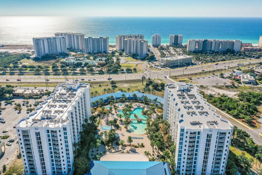 Experience breathtaking Gulf and sunrise views from this beautifully appointed 2-bedroom, 2-bath residence, perfectly positioned to overlook the pristine natural beauty of Henderson Beach State Park. With unobstructed vistas and a highly sought-after location, this unit offers the ultimate coastal retreat.

Offered fully furnished and truly turnkey, this residence is ready for immediate enjoyment or rental income. The kitchen is thoughtfully designed with rich maple cabinetry, granite countertops, and ample space for both everyday living and entertaining. The open-concept floor plan flows seamlessly into the living and dining areas, all oriented to maximize those stunning Gulf views. The spacious primary suite features a king-sized bed, flat-screen TV, and a relaxing ambiance perfect for unwinding after a day at the beach. A custom-built bunk area with full-size bunks provides additional accommodations, ideal for guests or maximizing rental potential.

Residents and guests enjoy access to an exceptional array of resort-style amenities, including a lush, tropical pool deck featuring Destin's largest lagoon-style pool with cascading waterfalls, a kiddie pool, hot tub, and splash pad. Additional amenities include a playground, fitness center, and with pickleball, tennis and basketball courts--offering something for everyone.

Whether you're searching for a primary residence, second home, or investment property, this coastal gem delivers the perfect blend of luxury, comfort, and convenience.