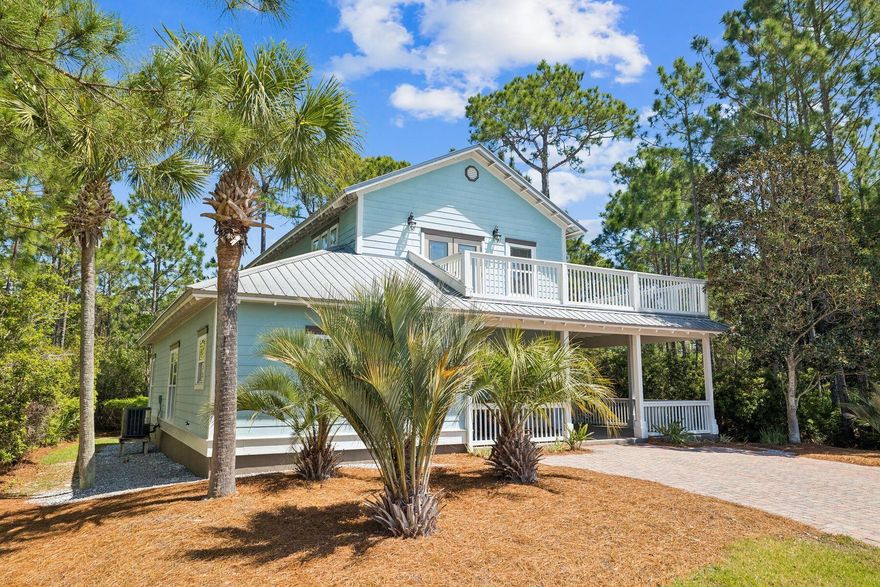 Welcome to 14 Breezeway Boulevard, a beautifully appointed, fully furnished beach house in the gated community of Cypress Breeze Plantation in Santa Rosa Beach along Scenic 30A. Offering 3 bedrooms plus a versatile bonus room that can easily serve as a 4th bedroom, office, or additional living space, this approximately 2,301-square-foot home blends refined coastal style with effortless livability.

Framed by a gracious wraparound porch and set against a private preserve backdrop, the home exudes classic Southern charm. Inside, a thoughtfully designed open floor plan features wood-look tile flooring, crown molding, and an expansive kitchen with quartz countertops, stainless steel appliances, and a generous dining area ideal for gathering and entertaining. Ideally located just moments from Gulf Place, Scenic Highway 30A's white-sand beaches, and close proximity just steps from the community's resort-style pool, residents enjoy both convenience and a relaxed coastal lifestyle. Cypress Breeze offers low HOA dues, a vibrant neighborhood atmosphere, and allows both short- and long-term rentals, making this an exceptional opportunity as a primary residence, second home, or investment property. Recent upgrades include two new Trane HVAC systems (2025) and a water heater (2021).