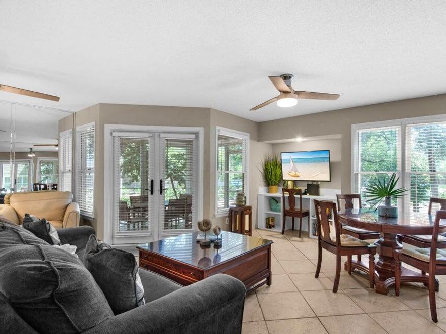 Tucked inside the beautifully wooded and highly sought-after Hidden Dunes community, this charming ground floor end-unit is the perfect coastal retreat. Surrounded by mature trees and lush landscaping, Hidden Dunes is known for its quiet, quaint feel--offering a peaceful escape while still being just steps from everything you love about the beach.

This one-bedroom, one-and-a-half bath condo offers over 800 square feet of comfortable living space, with a spacious primary suite and a queen sleeper sofa to accommodate guests. The open floor plan features a bright kitchen with a raised breakfast bar, tile flooring throughout, and a generous living area complete with a built-in desk, dining space, and cozy reading nook. Being sold fully furnished, it's truly move-in or rental ready. French doors lead to an oversized screened porch--one of the best spots to start your morning or unwind after a day in the sun. From here, you have easy access to the walking trails, the Beach & Racquet Club, and of course, the private beach access that makes Hidden Dunes so special.

Owners and guests enjoy a true resort-style experience with amenities that include multiple pools (with a heated option for cooler months), hot tubs, a playground, outdoor grilling areas, and a seasonal tram that makes trips to the beach effortless. The Beach & Racquet Club is a standout feature, offering tennis and pickleball in a beautifully maintained setting just moments from your door.

And the location? It's hard to beat. Situated south of Highway 98 with no roads to cross, you're just a short stroll or bike ride to the sugar-white sand beaches, as well as nearby dining, shopping, and entertainment. Sandestin, Scenic Gulf Drive, Silver Sands Outlet Mall, and 30A are all just minutes away.

Whether you're looking for a second home, investment property, or your own little slice of paradise, this Hidden Dunes gem offers the perfect blend of privacy, charm, and coastal convenience.

**NEW ROOF INSTALLED 2025. COMMUNITY REPAVED 2026. ALL SPECIAL ASSESSMENTS PAID IN FULL.**