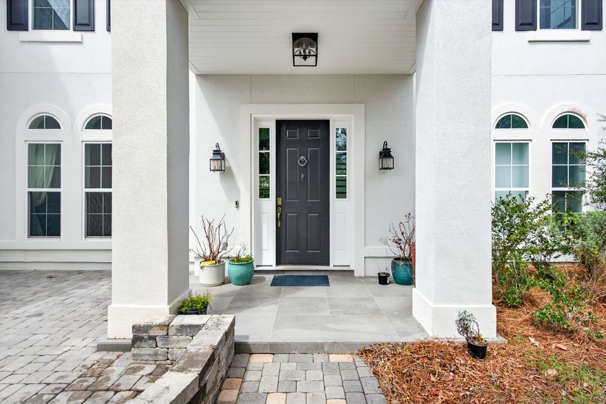 3202 Blue Heron Boulevard is a beautiful, spacious home in the private, gated community of The Preserve on the Bay!  It's location in East Panama City Beach provides access to the amazing emerald waters and white sugar sand beaches of the Gulf along with St. Andrews State Park, marinas, access to the Bay, and great restaurants and entertainment options!
Built in 2019, this home boasts 4 bedrooms and 4 full bathrooms, with an additional half bath on the first floor. The large primary suite is conveniently located on the first floor.  The home spans 3,420 square feet of spacious, luxury living on a .26 acre lot. There is an addition living area on the second floor that can also serve as a library, theater, game room, office space or bonus room!  Upgrades in this spacious home include;  a paver patio with a half wall in the front of the house, all closets have built in shelving, built in shelves and seating in the Library/upstairs living area,  banquette seating in the kitchen, 2 triple bunk beds in one of the bedrooms to accommodate a large family or guests. This home also has rain gutters on the front and back of the home, a new Bosch dishwasher, double oven with air fryer feature new in 2023, a gas stove and a tankless water heater.  The oversized 2 car garage has room for storage or space for a golf cart.  The spacious back yard would also accommodate a swimming pool!