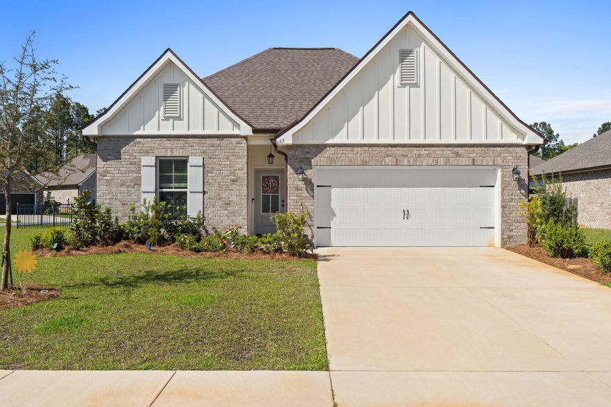 Welcome to 65 Apollo Avenue East situated on a desirable corner lot in the Moonswept neighborhood of Creekside in Hammock Bay. This beautifully upgraded home lives large due to it's seamless flow-loop design.

Showcasing approximately $43,000 in combined builder and owner upgrades, delivering exceptional value and move-in-ready appeal. The thoughtfully enhanced interior includes a stunning $10k renovation to the dining and living areas, elevating both style and functionality.

The kitchen is designed for entertaining with a large island, walk-in pantry, custom backsplash, undermount sinks, recessed lighting, and crown molding throughout. The private primary suite features a double vanity, garden tub, separate custom tiled shower, and a generous walk-in closet. Additional highlights include a second bath with double vanity and a fourth bedroom with its own en-suite bath--perfect for guests or multi-generational living.

Step outside to enjoy the screened-in covered rear porch, ideal for relaxing year-round. The fully fenced backyard (approximately $10k upgrade), gutters, and enhanced landscaping add both beauty and practicality.

Additional features include architectural 30-year shingles, framed mirrors, flood lighting, and energy-efficient components such as Low-E windows and an electric water heater.

Don't miss this opportunity to own a highly upgraded home in one of Freeport's most desirable communities--offering incredible lifestyle amenities and a strong sense of community.