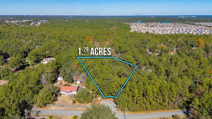 Looking for over an acre in SOUTH CRESTVIEW???  Look no further!  Here is your opportunity to create your own oasis in the middle of all of the action.