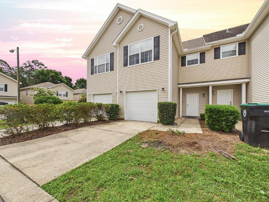 This beautifully maintained 3-bedroom, 2.5-bathroom end-unit townhome spans 1,696 square feet and offers an exceptional location walking distance to local coffee shops, breweries, and eateries. Ideally situated in Niceville, you will enjoy quick access to Eglin AFB, local shopping, and Destin's world-class beaches. Step inside to an open, light, and bright floor plan featuring 9-foot volume ceilings, 4-inch baseboards, and beautiful vinyl plank flooring and ceramic tile. The spacious kitchen is a chef's delight, offering solid-surface countertops, plentiful wood cabinetry, a breakfast bar, and a large pantry. Upstairs, a perfectly positioned laundry closet serves the bedrooms, including a massive master suite boasting vaulted ceilings, a walk-in closet, and a luxurious bath with a garden tub and separate shower. Notable upgrades provide ultimate peace of mind, including a brand-new roof (2026), a new hot water heater (2025), and a pristine one-car garage with an epoxy floor finish. Outside, relax on your covered porch or back patio overlooking the green space. The low-maintenance HOA fee covers ground keeping, irrigation, road maintenance, and lights. Available for immediate occupancy, schedule your viewing today!