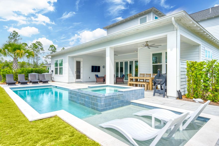 Tucked away on a peaceful cul-de-sac within the gated community of NatureWalk at Watersound Origins, this stunning modern residence is positioned on one of the largest oversized premium lots offering a private oasis for seamless indoor-outdoor living. With a sprawling backyard backing up to a protected preserve, this meticulously maintained 4 bedroom + large bonus room/office, 4.5 bath home features over 4,900 sq ft of thoughtfully designed indoor/outdoor living space with elevated finishes, exceptional craftsmanship, and $350K+ in upgrades, including dual oversize AC units. Expansive 5-panel folding glass doors connect the main living space to the covered patio, outdoor kitchen, firepit, and resort-style pool and spa, while a 3-car garage completes this rare move-in-ready opportunity. Designed for both everyday comfort and elevated entertaining, the open-concept living, dining, and kitchen spaces create the true heart of the home, seamlessly blending refined design with exceptional functionality. The spacious main living area flows effortlessly through five-panel folding glass doors to the extended covered patio, creating remarkable indoor-outdoor connectivity. The gourmet kitchen is beautifully appointed with dazzling quartz countertops, high-end GE Café appliances, including a 60-inch gas cooktop, large island with extra seating space, generous dining space, and thoughtful design touches that enhances both gathering and daily living. The first-floor primary suite offers a private retreat with a spa-inspired bath featuring a soaking tub, oversized multi-head shower, and custom walk-in closet with built-ins. A large bonus room or office, powder bath, and spacious laundry/mud room with sink complete the main level, while the second floor offers three additional ensuite bedrooms and a separate living and entertainment space, providing flexibility for guests, work, or relaxation. Outdoors, the expansive backyard is designed for year-round enjoyment with serene preserve views, a private pool and spa, covered entertaining areas, outdoor kitchen, and firepit.
NatureWalk at Watersound Origins offers a gated lifestyle with access to exceptional resort-style amenities, including community pools, fitness centers, tennis and pickleball courts, walking and biking trails, golf, and access to Lake Powell for paddleboarding and kayaking. Ideally located near Watersound Town Center, Publix, dining, shopping, and the renowned beaches of 30A, this home offers convenient access to the best of the Emerald Coast while providing the privacy, tranquility, and upscale living that define this highly desirable community.