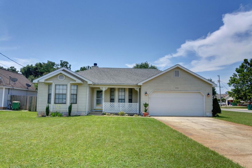 CHARMING is the best word to describe this adorable 3 bedroom 2 bath home, situated on a large corner lot with fenced in yard. Located in East Navarre and only 3 minutes to the Beaches and 15-20 minutes to Hurlburt AFB. The floor plan is open, light and bright with wood laminate flooring in the main living area, cozy fireplace, stainless appliances in the kitchen, large inside laundry room and a split floor plan with carpet in the bedrooms. Enjoy your master retreat with trey ceilings, private bath and french door leading out to the open patio and deck area of the back yard. Such a great home for the money, so schedule your private showing today!