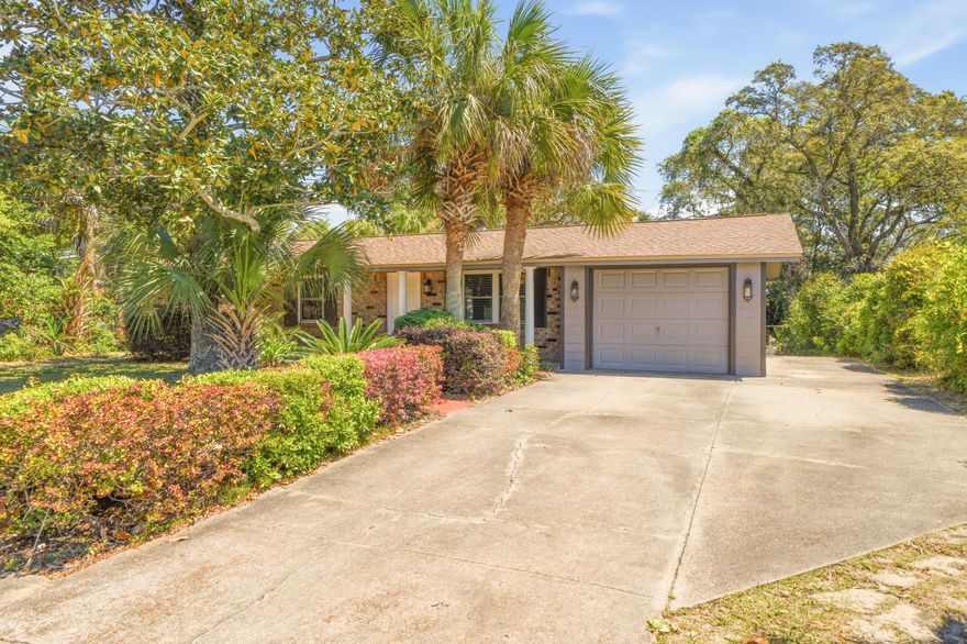 Welcome to 417 NW Sherry Circle in the heart of Fort Walton Beach! This well-maintained home offers a spacious, open-concept layout with durable tile flooring throughout--perfect for easy maintenance and everyday living.
The kitchen features abundant cabinetry, stainless steel appliances, and generous counter space, flowing seamlessly into the living and dining areas--ideal for entertaining. The living room is warm and inviting with a beautiful stone fireplace and plenty of natural light.
Enjoy additional living space with a large screened-in porch, perfect for relaxing year-round while taking in views of the private backyard. The outdoor area is shaded by mature trees and offers ample space for a variety of outdoor activities. A detached workshop/shed provides excellent storage or workspace for tools, hobbies, or equipment.
Additional highlights include a functional layout with flexible-use spaces, an indoor laundry area, and ample parking with a driveway and attached garage.
Conveniently located with easy access to shopping, dining, and area beaches, this home offers a great combination of comfort and accessibility.
Don't miss your opportunity to own a property with both indoor and outdoor living space in a desirable Fort Walton Beach location!