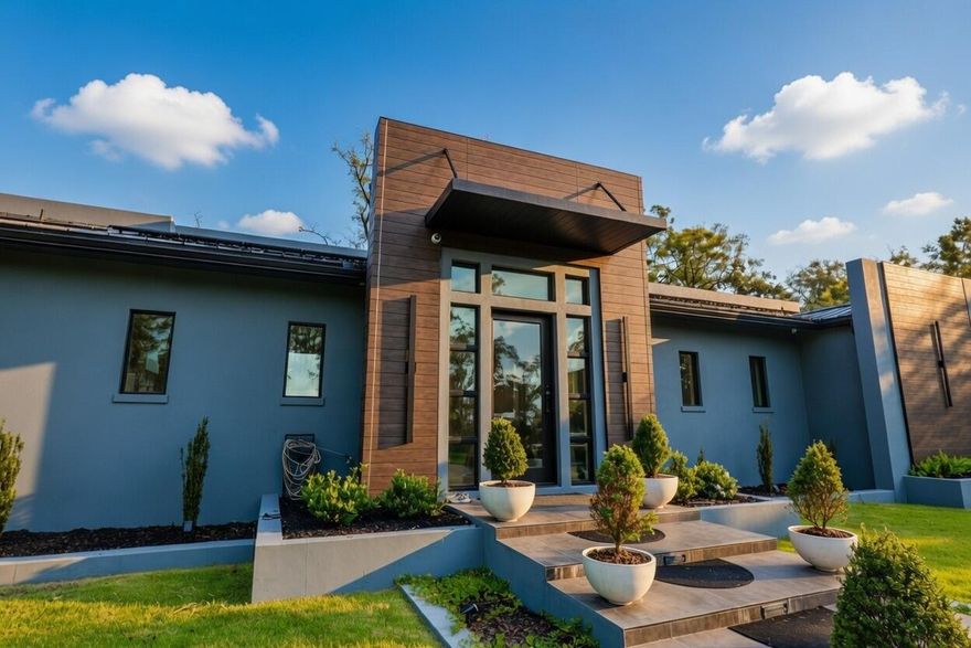 Set on two extraordinary acres, this rare bayfront estate offers exceptional privacy, scale, and presence.

Positioned directly on the water, this fortress-style residence was constructed in 2023 for durability, security, and long-term ownership. The home features two bedrooms and two and one-half baths, yet lives far beyond its footprint with expansive living areas, soaring ceilings, and walls of glass capturing panoramic bay views.

The primary suite is a private retreat with tranquil waterfront vistas, while guest accommodations reflect the same level of comfort and quality. Finishes throughout are thoughtfully selected, blending craftsmanship with timeless coastal design. Outdoor living is equally compelling. A waterfront pool overlooks the bay, and a private dock provides immediate access for boating, paddleboarding, and fishing. The grounds offer a level of space and privacy rarely found on bayfront property.

Additional features include a solar power system for low operating costs, solar pool heating, and an impressive collection of included assets: a double-decker Triton boat, two wave runners, a Rubicon Jeep, Hobie cat pedal kayaks, and an all-glass greenhouse. Floor plans for a potential carriage house are available.

This is a true waterfront estate--designed for privacy, built for strength, and positioned for generational ownership.